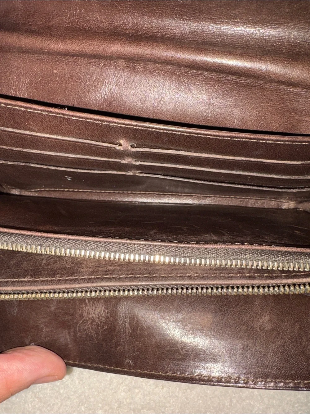 Louis Vuitton Monogram Charms Porte-Monnaie Wallet in brown (7.5 x 4in.)